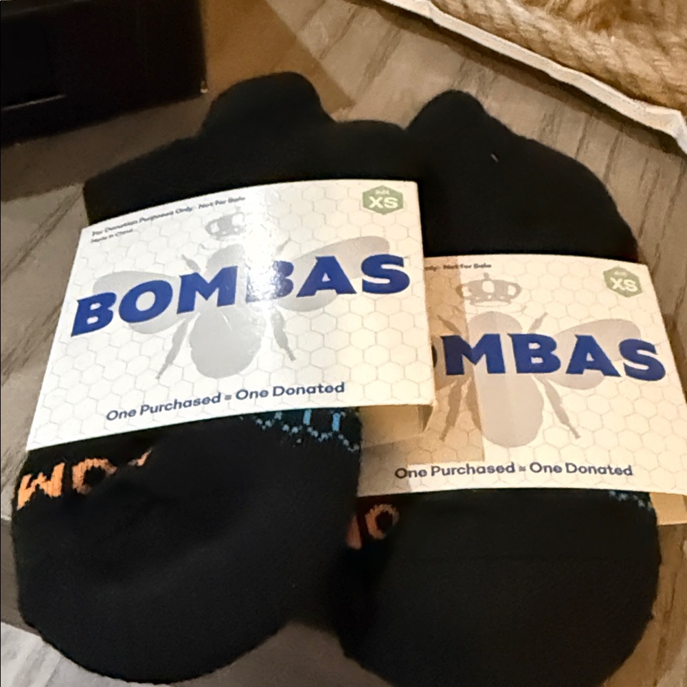 Bombas Black Ankle Socks with Subtle Orange Logo Accents